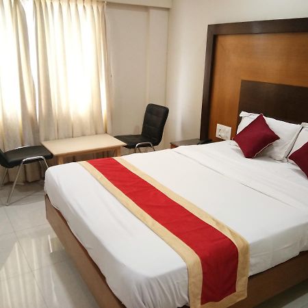 Hlv Grand Inn Bangalore Luaran gambar