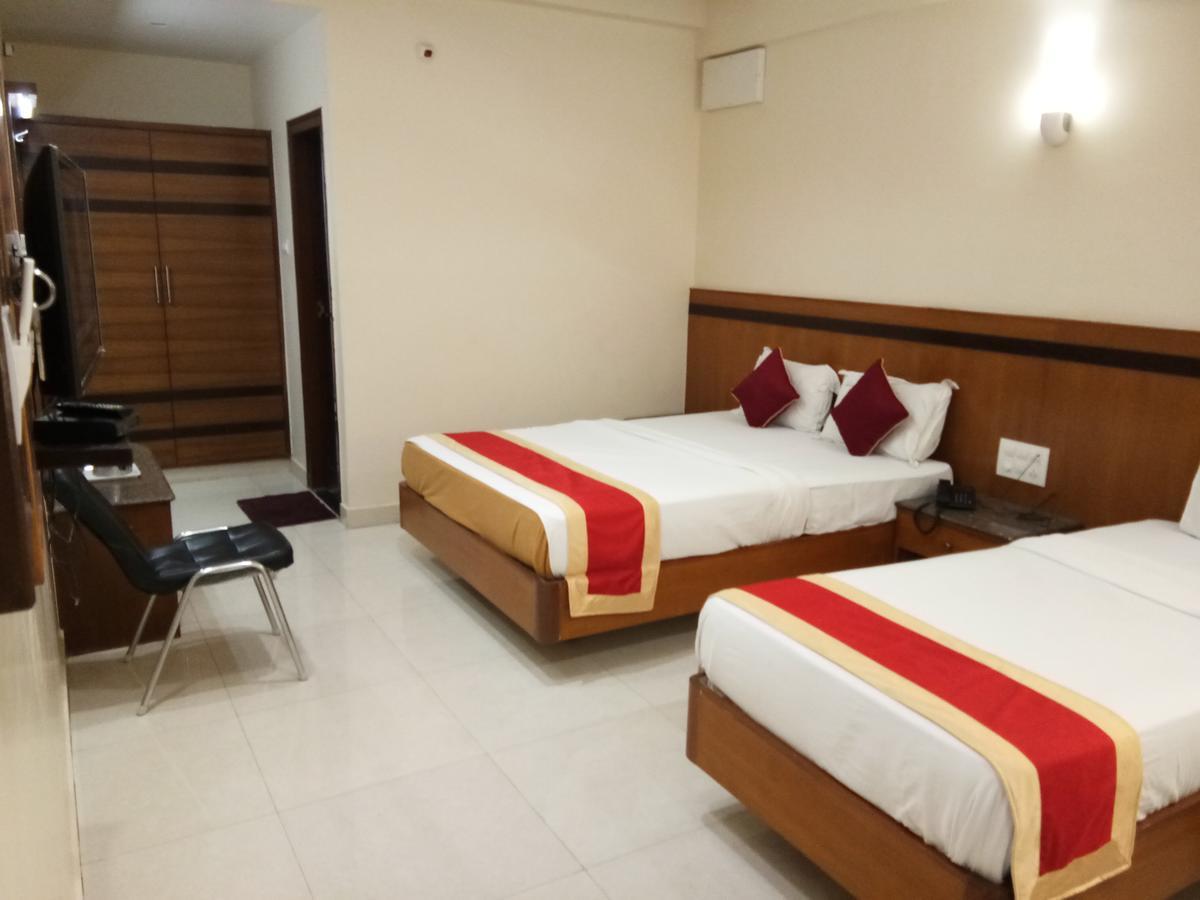 Hlv Grand Inn Bangalore Luaran gambar