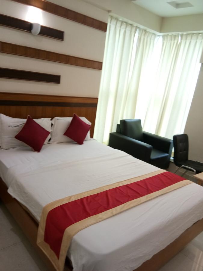 Hlv Grand Inn Bangalore Luaran gambar
